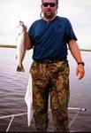 Wade with a huge Speckeled Trout